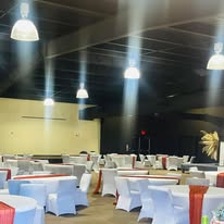 Phillips Event Center banquet setup with white chair covers